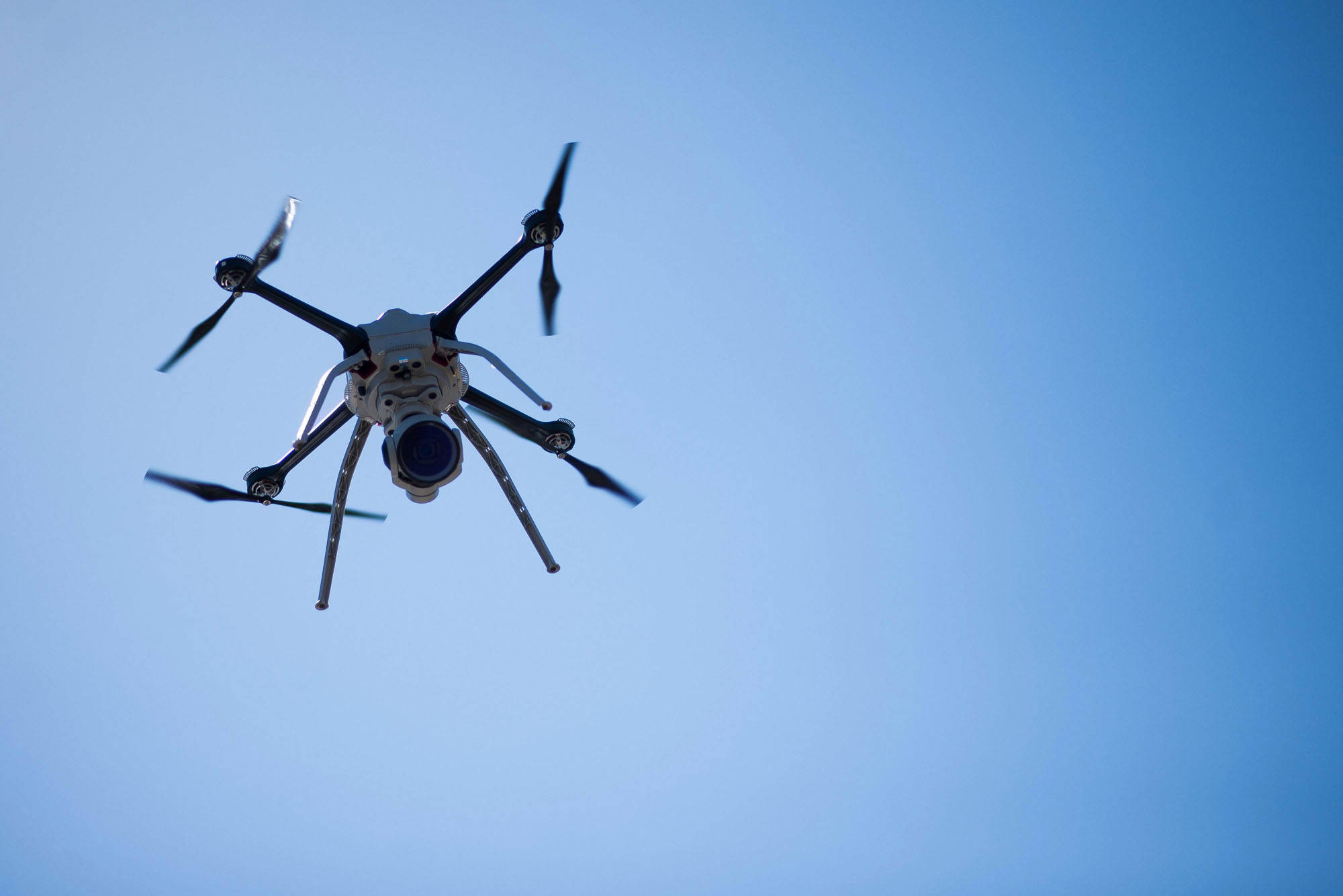A drone flies outside of the Aeryon Labs Inc. headquarters in Waterloo, Ontario, on April 14, 2016. Bloombergphoto by James MacDonald.