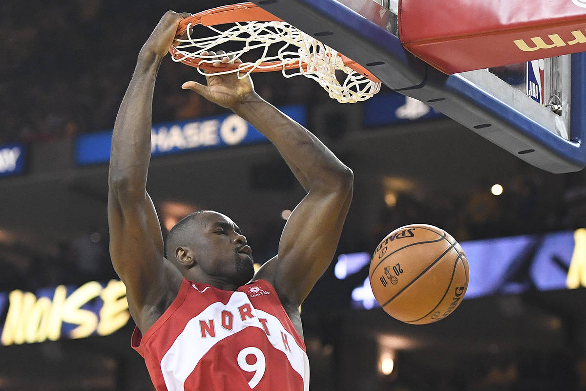 Toronto Raptors centre Serge Ibaka (9) dunks during second half basketball action against the Golden State Warriors in Game 4 of the NBA Finals in Oakland, California on Friday, June 7, 2019. THE CANADIAN PRESS/Frank Gunn