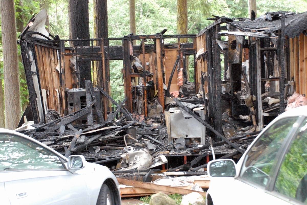 Fire burned down a single duplex structure on June 6 at the River Green Resort in Parksville. — Michael Briones photo