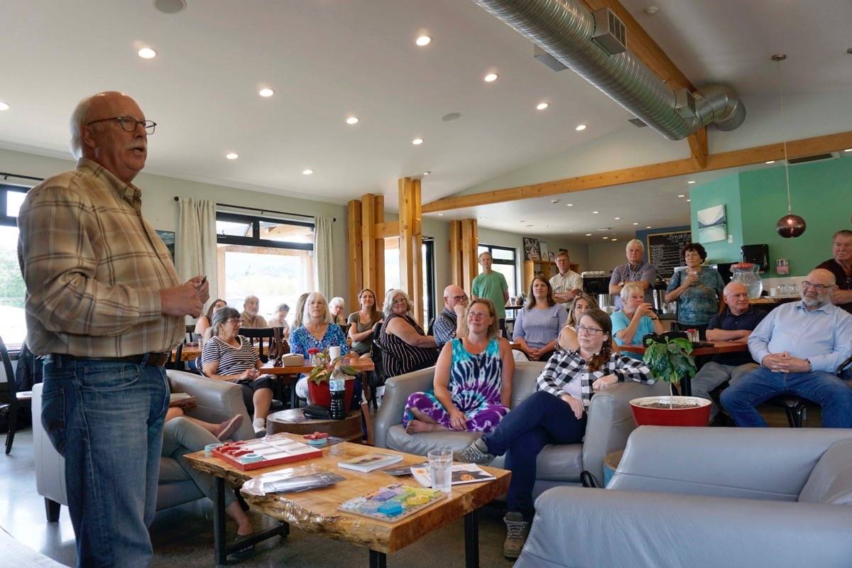 Ian Paton, MLA for Delta South and co-critic for agriculture, speaks to a group of concerned farmers at Rusted Rake Farm in Nanoose Bay on June 17. - Karly Blats photo