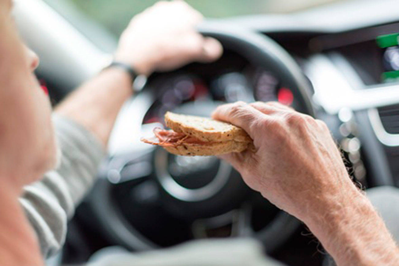 Eating while driving could cost you (Black Press Media)