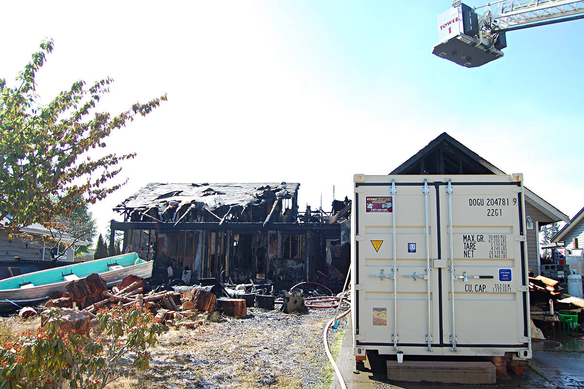 Flames destroyed a home in Campbell River on Tuesday. Photo by David Gordon Koch/Campbell River Mirror