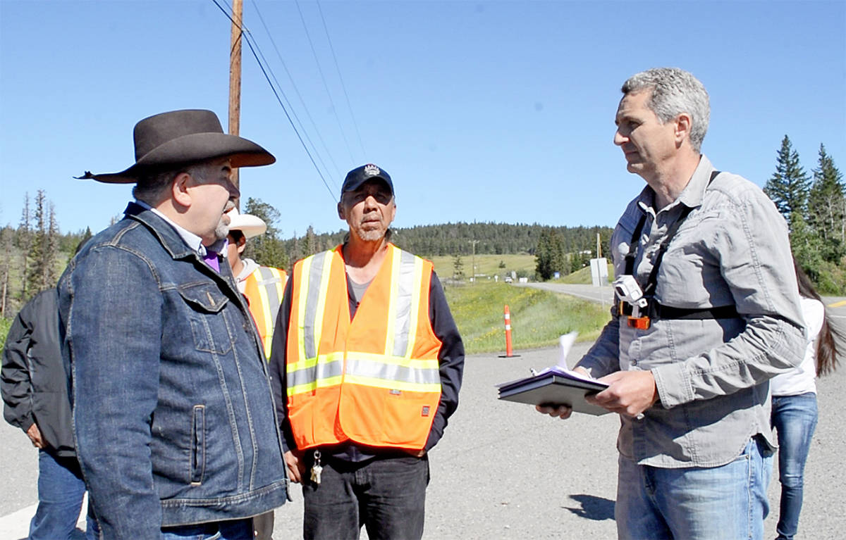 Chief Joe Alphonse, Tsilhqot’in National Government tribal chair, left, speaks with Finn Conradsen, Taseko Mines Ltd. New Prosperity Mine project manager Tuesday morning at the junction of Highway 20 and Farwell Canyon Road, 57 kilometres west of Williams Lake. The Tsilhqot’in set up a peaceful protest camp at the site Monday evening and are denying Taseko contractors access to haul heavy equipment in for exploratory drilling at the proposed New Prosperity Mine site, 185 km southwest of Williams Lake. Monica Lamb-Yorski photo
