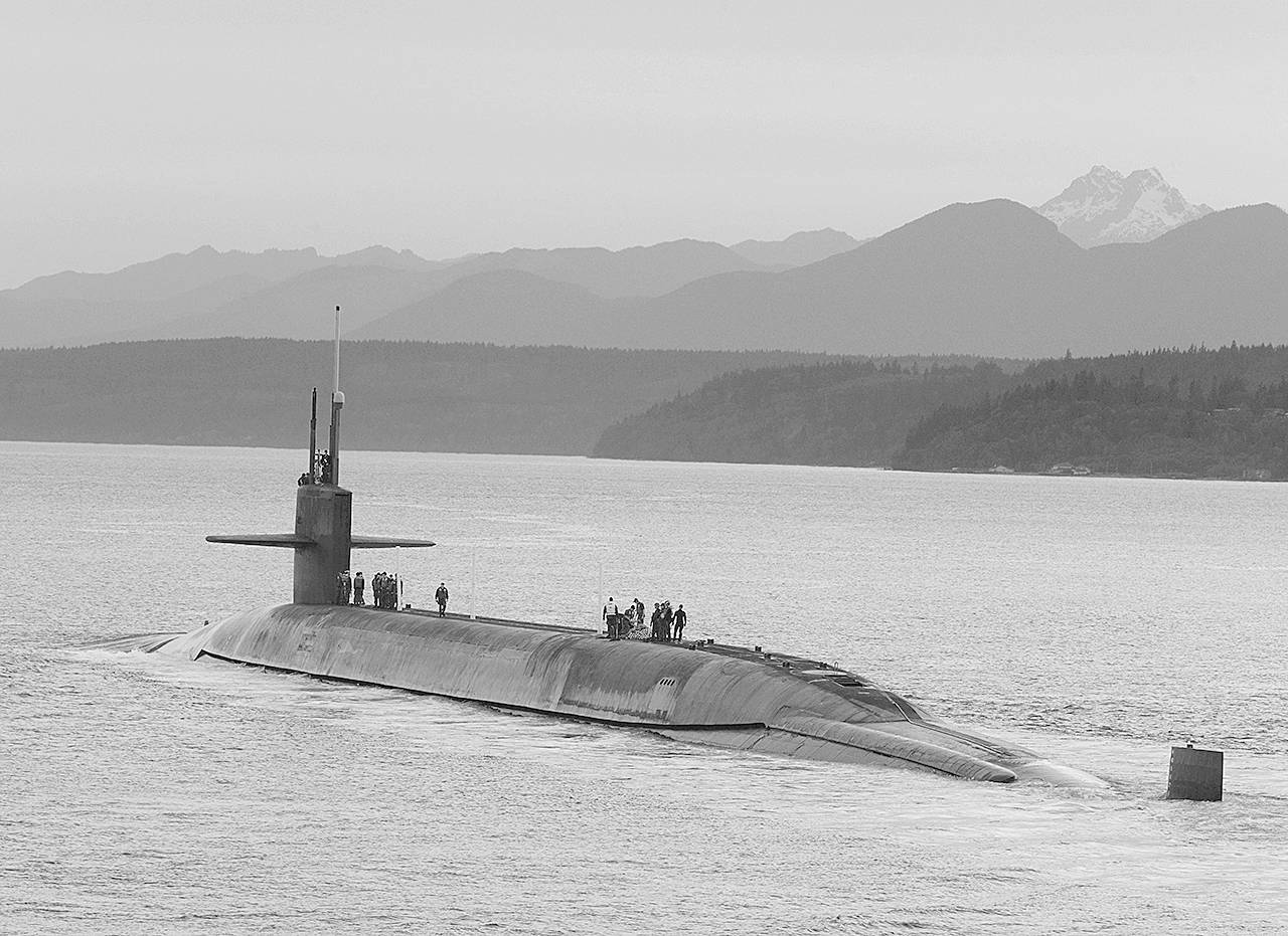 150509-N-KZ413-045 BANGOR, Wash. (May 5, 2015) The ballistic-missile submarine USS Henry M. Jackson (SSBN 730) arrives home at Naval Base Kitsap-Bangor following a strategic deterrent patrol. Henry M. Jackson is one of eight ballistic missile submarines stationed at the base providing the survivable leg of the strategic deterrence triad for the United States. (U.S. Navy photo by Lt. Cmdr. Brian Badura/Released)