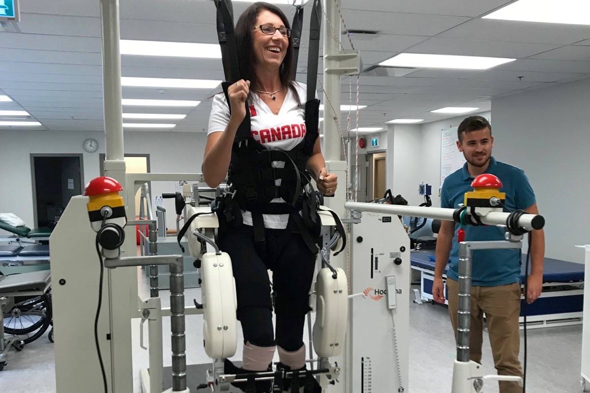 Michelle Stilwell, MLA for Parksville-Qualicum, uses the Lokomat machine at the Neuromotion Physio clinic in Victoria. - Submitted photo
