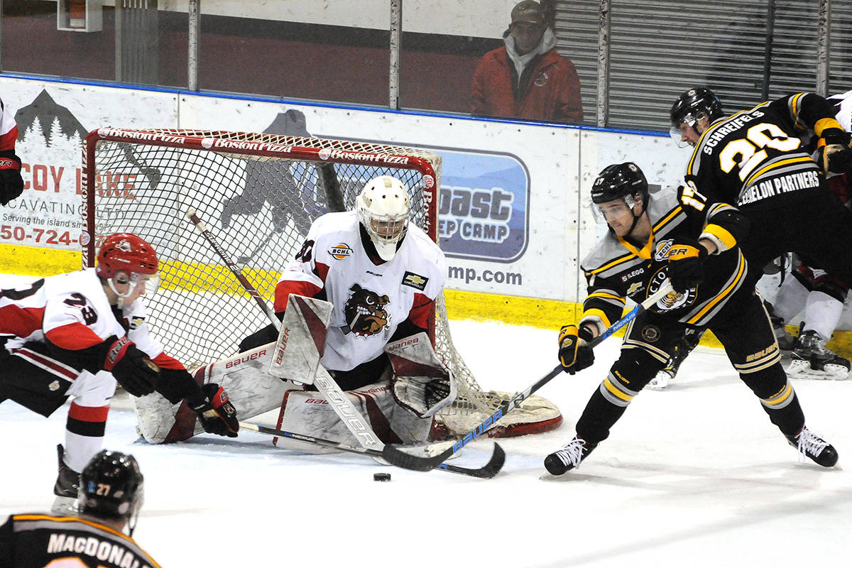 Victoria Grizzlies’ forward Marty Westhaver fails to score in front of Alberni Valley Bulldogs’ goalie John Hawthorne midway through the third period of Game 4 in the BCHL Island Division’s opening playoff round, March 6. SUSAN QUINN PHOTO