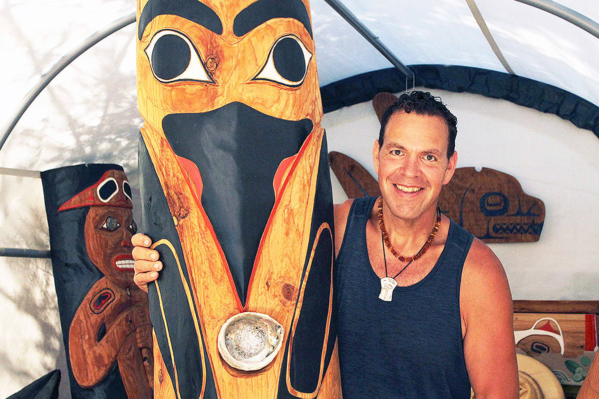 Mike Bellis’s shop is full to the brim with wooden pieces that he’s carved over the past seven months. (Emily Vance photo)