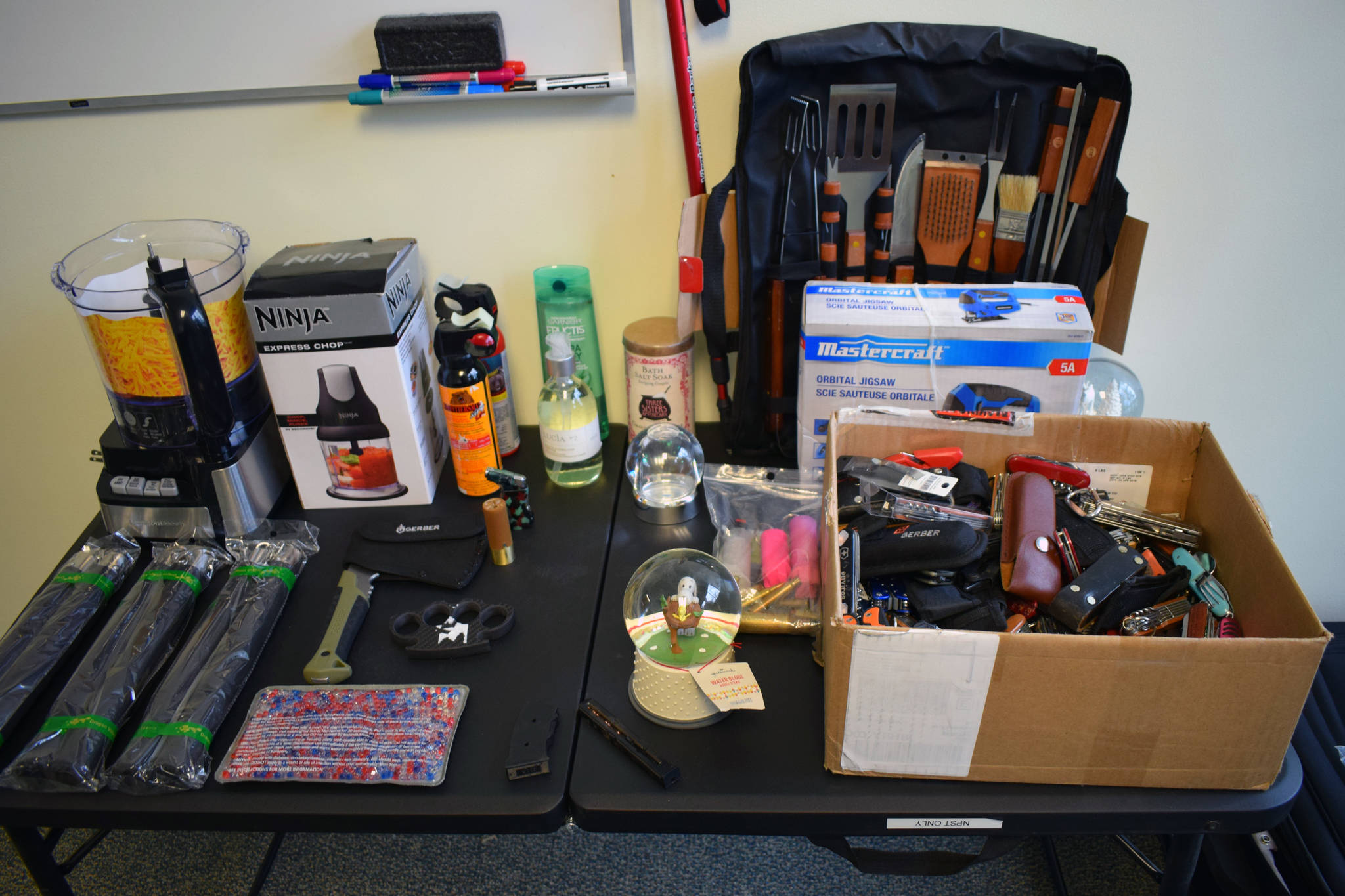A hatchet, brass knuckles, torch lighters and pepper spray, as well as a barbecue kit and snow globes were among some of the items pulled during security screenings at the Victoria International Airport over the last two weeks. (Kevin Menz/News Staff)