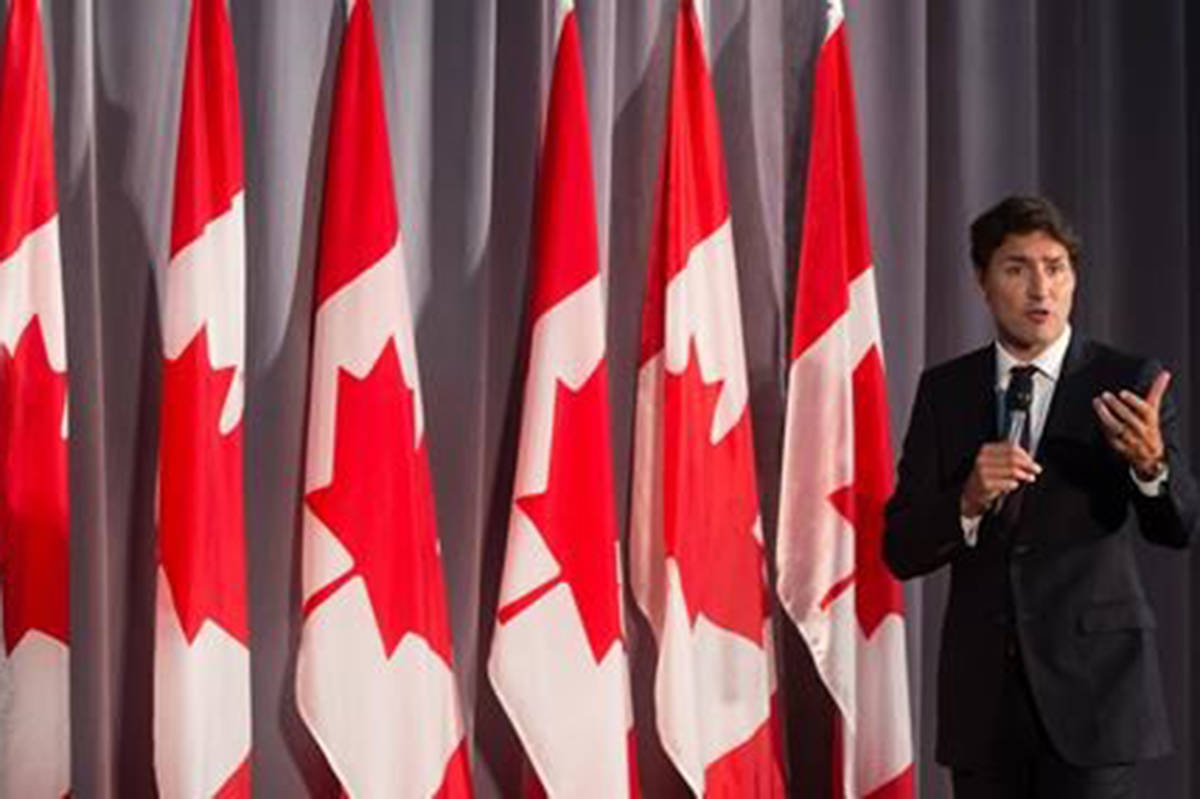 Prime Minister Justin Trudeau addresses supporters during a Liberal Party fundraiser in Surrey, B.C., Sunday, Aug. 4, 2019. Prime Minister Justin Trudeau is facing pressure from civil society groups to update Canadians before the October election on his government’s review of a multibillion-dollar arms deal with Saudi Arabia. THE CANADIAN PRESS/Darryl Dyck