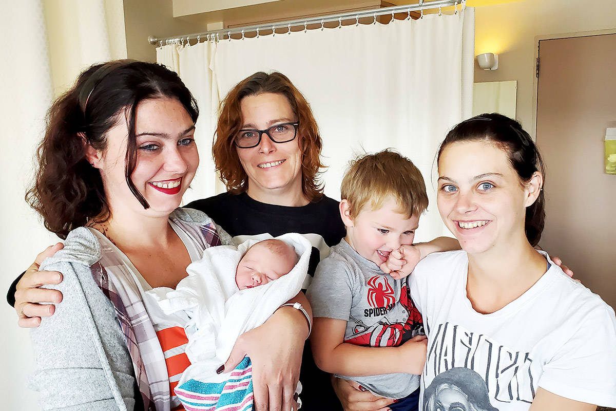 Shaiyena Currie (right) with her son Tristan, newborn daughter Octavia, sister Chelsea Currie, (left), and her mom, Shannon Dickson at Cariboo Memorial Hospital. Monica Lamb-Yorski photo