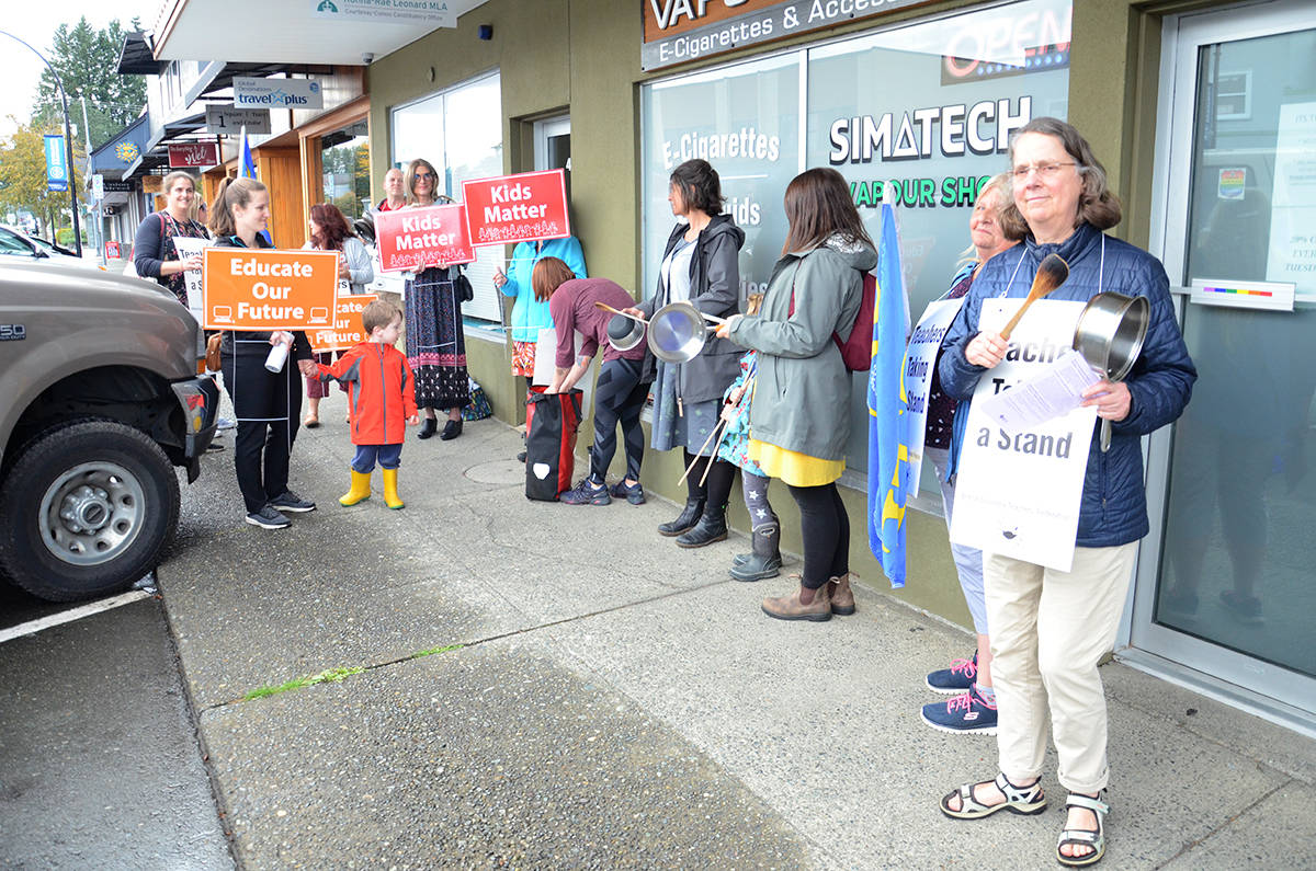 The group representing teachers set up outside MLA Ronna-Rae Leonard’s office in Courtenay. Photo by Mike Chouinard