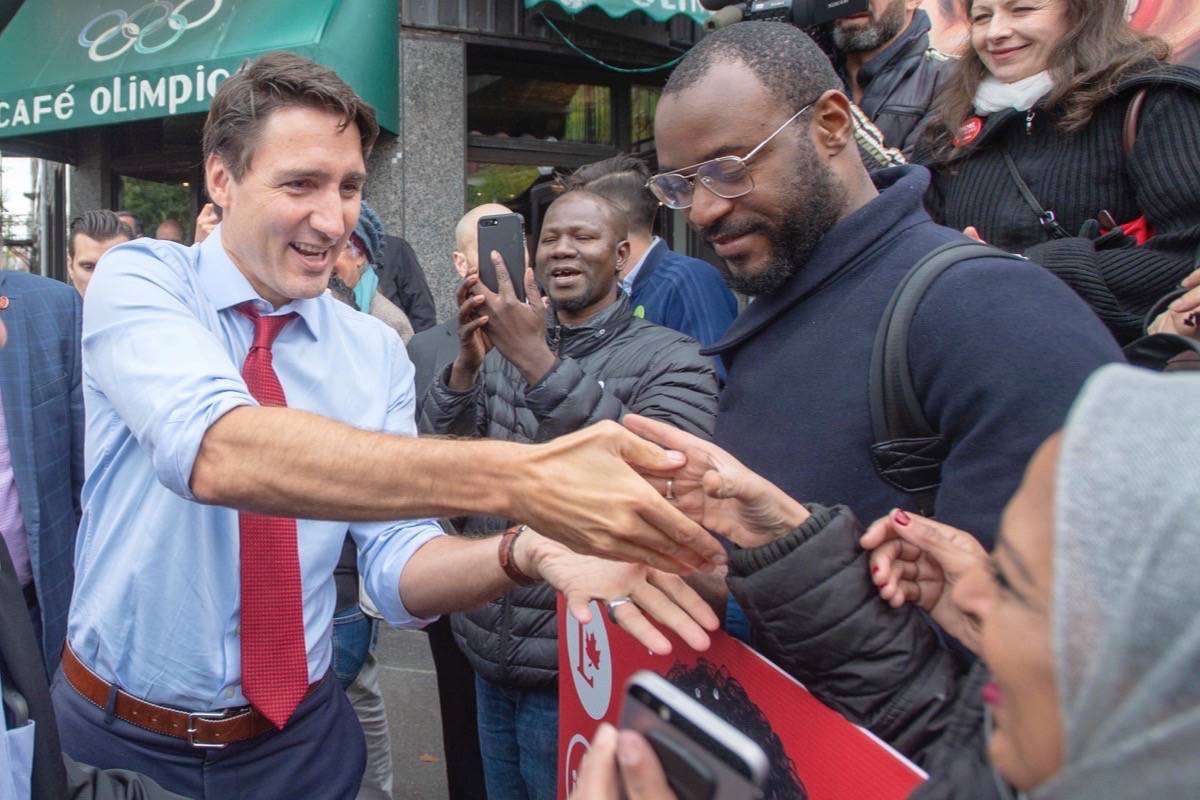 Liberal leader Justin Trudeau greets supporters while campaigning Thursday, October 3, 2019 in Montreal, Quebec. THE CANADIAN PRESS/Ryan Remiorz