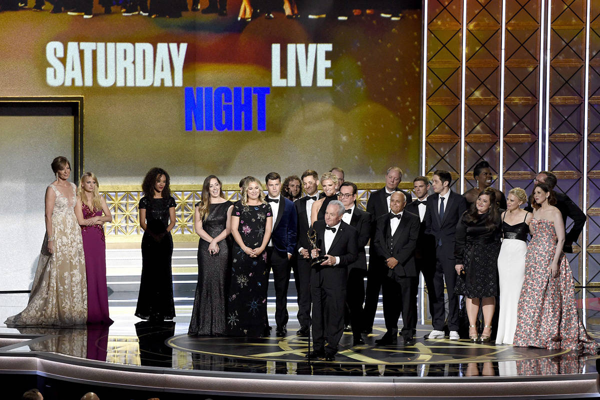 Lorne Michaels and the cast of SNL accept the award for outstanding variety sketch series for “Saturday Night Live” at the 69th Primetime Emmy Awards on Sunday, Sept. 17, 2017, at the Microsoft Theater in Los Angeles. (Photo by Chris Pizzello/Invision/AP)