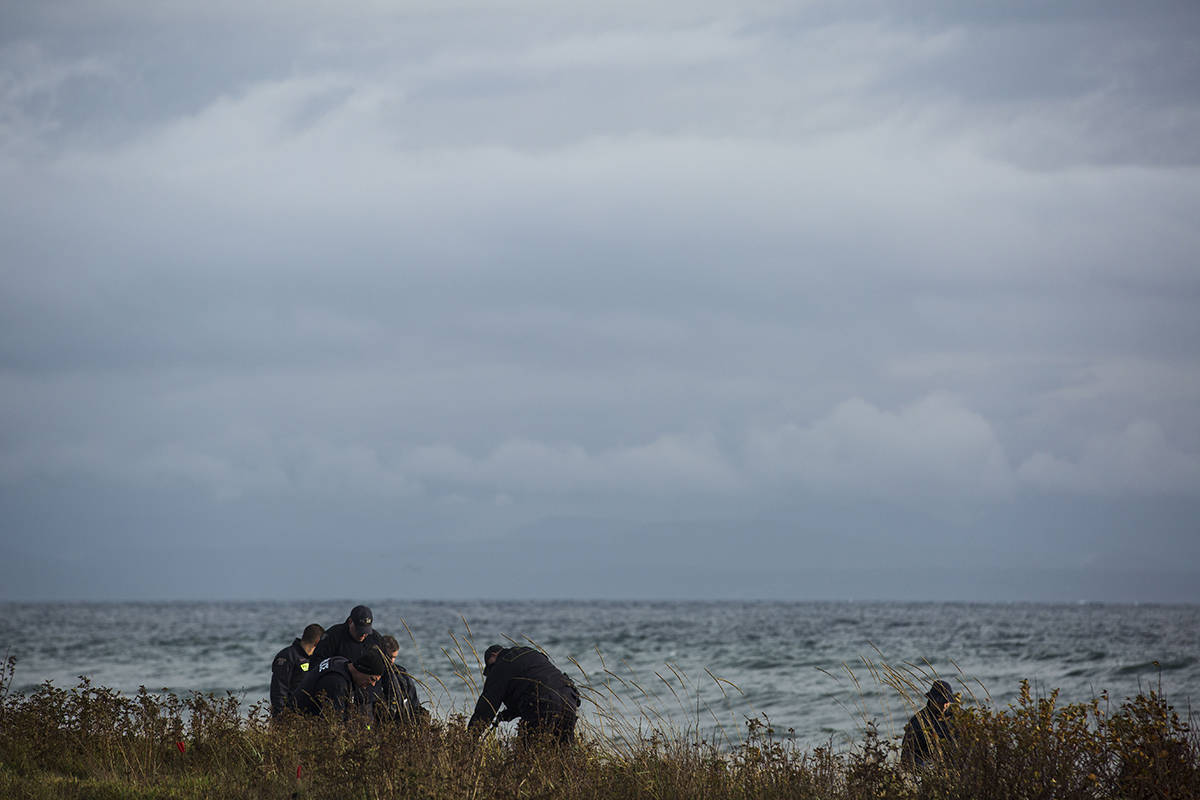 RCMP members search an area along the shoreline at Stories Beach south of Campbell River, B.C. on Oct. 17, 2019. According to local RCMP, the search is not related to the Oct. 16 homicide in south Campbell River. Photo by Marissa Tiel/ Campbell River Mirror