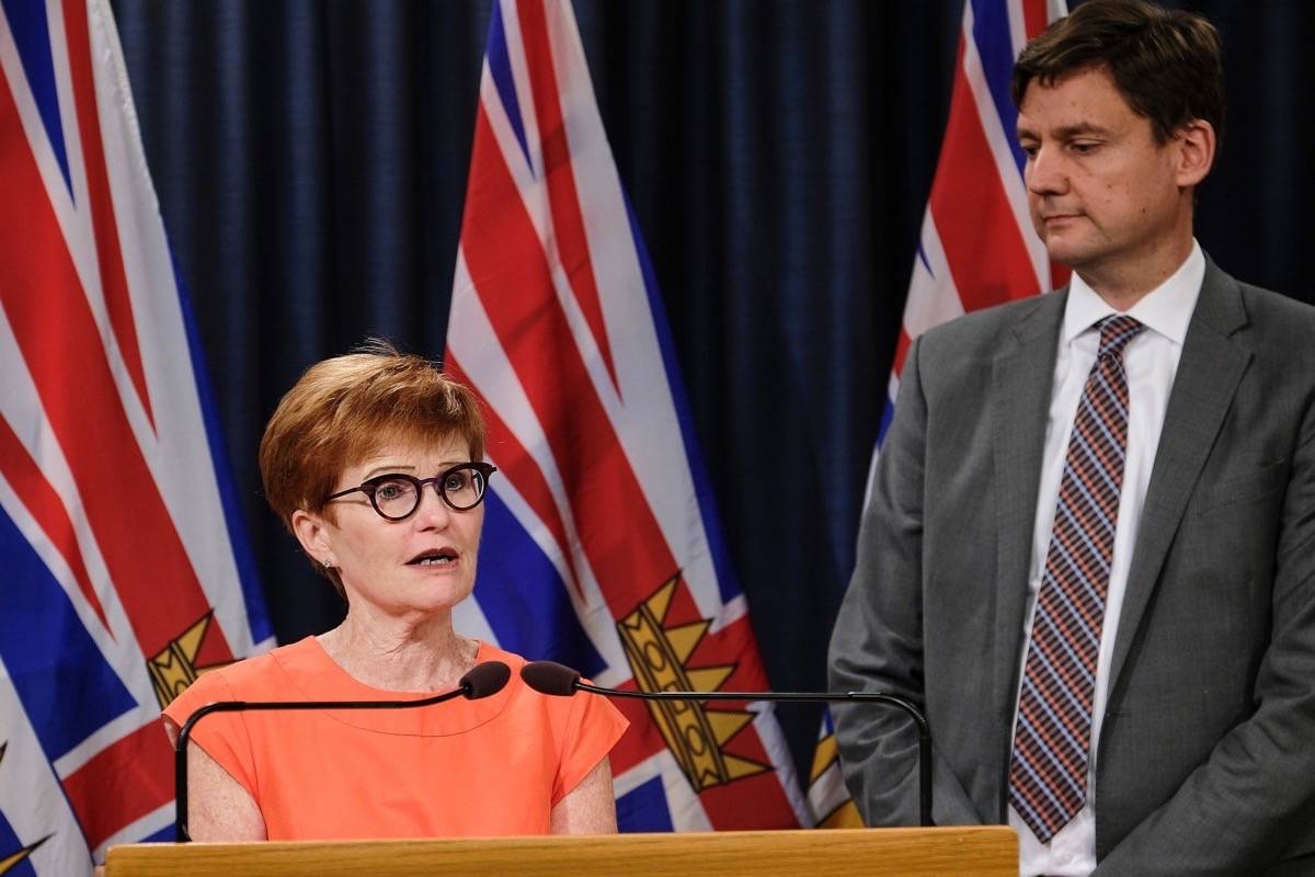 B.C. Attorney General David Eby introduces former NDP cabinet minister Joy MacPhail as chair of the ICBC board, Aug. 19, 2018. (B.C. government)