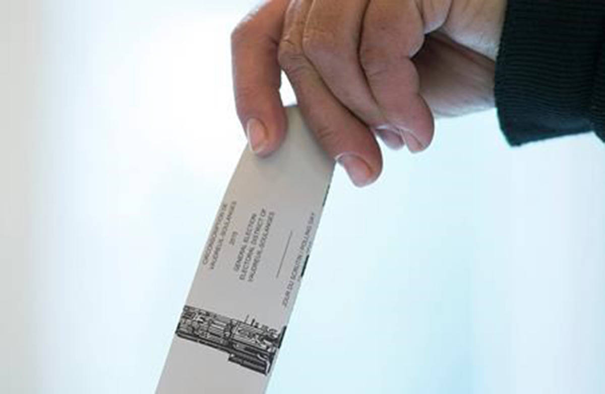 A woman casts her ballot in the riding of Vaudreuil-Soulanges, west of Montreal, on election day on October 19, 2015. Courts in Quebec and British Columbia have ordered recounts in two ridings where the runners-up are hoping a review could snatch victories from the jaws of every-so-narrow losses. THE CANADIAN PRESS IMAGES/Graham Hughes