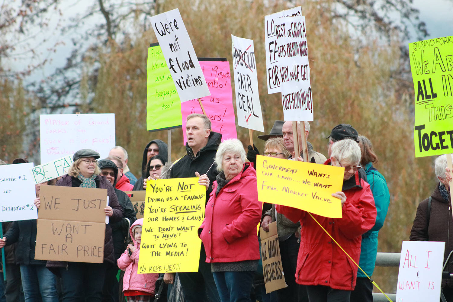 Grand Forks residents rally on Nov. 15 to raise awareness about the flood buyout process and to ask for “a fair deal.”                                (Jensen Edwards/Grand Forks Gazette)