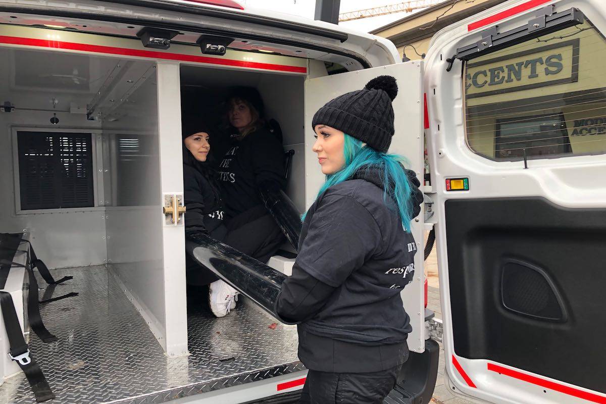 RCMP cut free activists chained to Kelowna bank, placed under arrest
