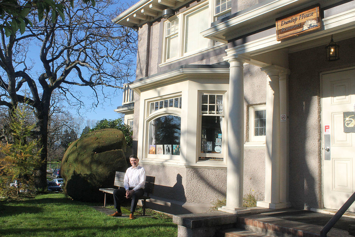 Camosun College instructor David Armstrong sits in the sun outside Dunlop House. (Sophie Heizer/News Staff)