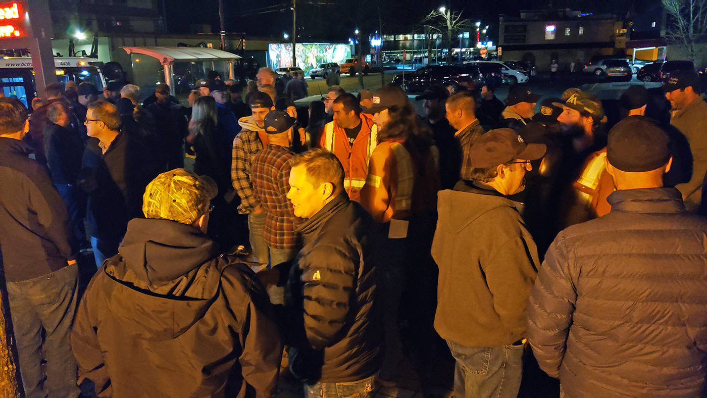 What was initially supposed to be a series of presentations put on by the Sierra Club of BC and the Wilderness Committee at the Community Centre on Monday night instead became a support rally for foresry workers in the region outside the locked doors with signs on them that announced the event had been cancelled. Photo by Mike Davies/Campbell River Mirror