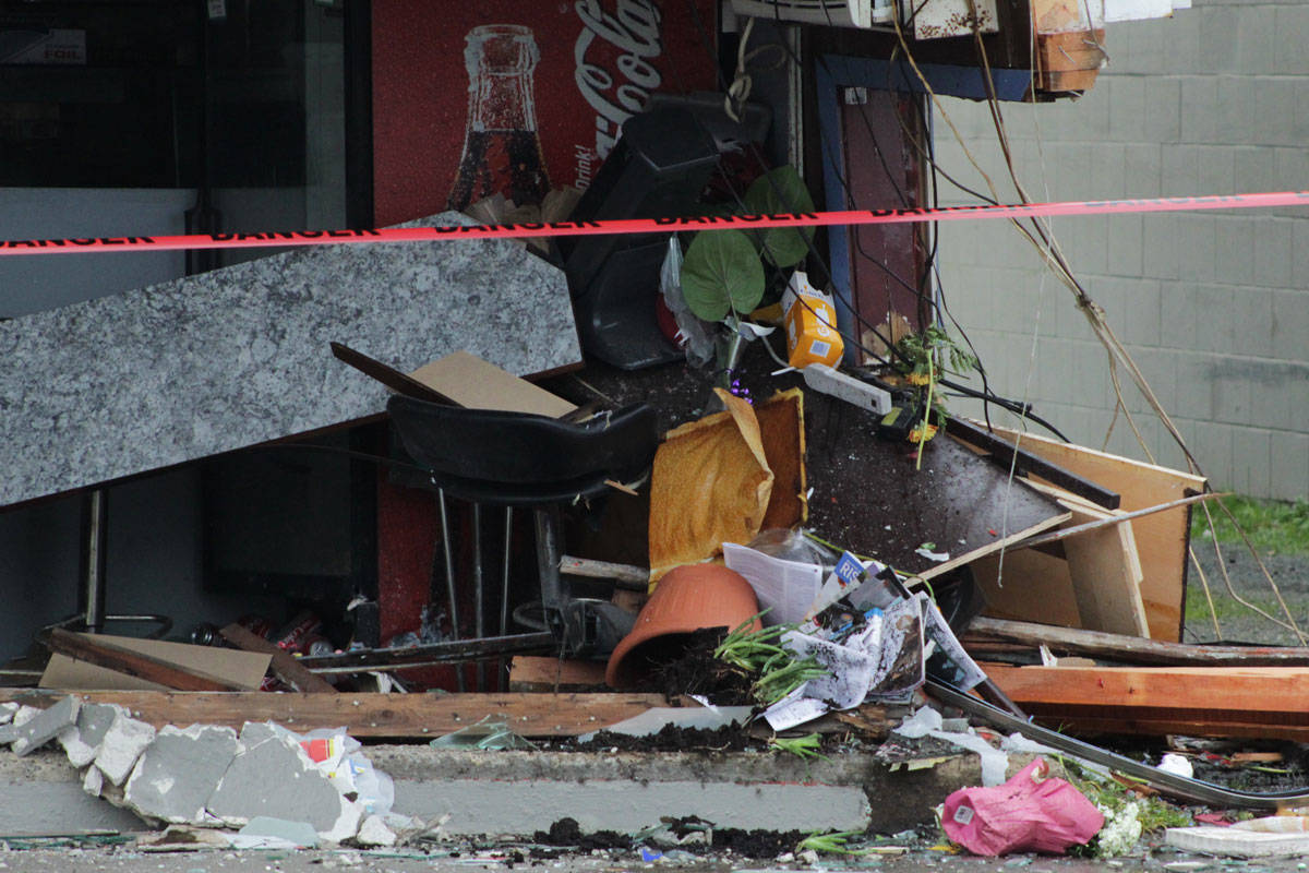The driver of a red SUV crashed through the window of Kuku’s Restaurant on Wednesday morning causing extensive damage. (Devon Bidal/News Staff)