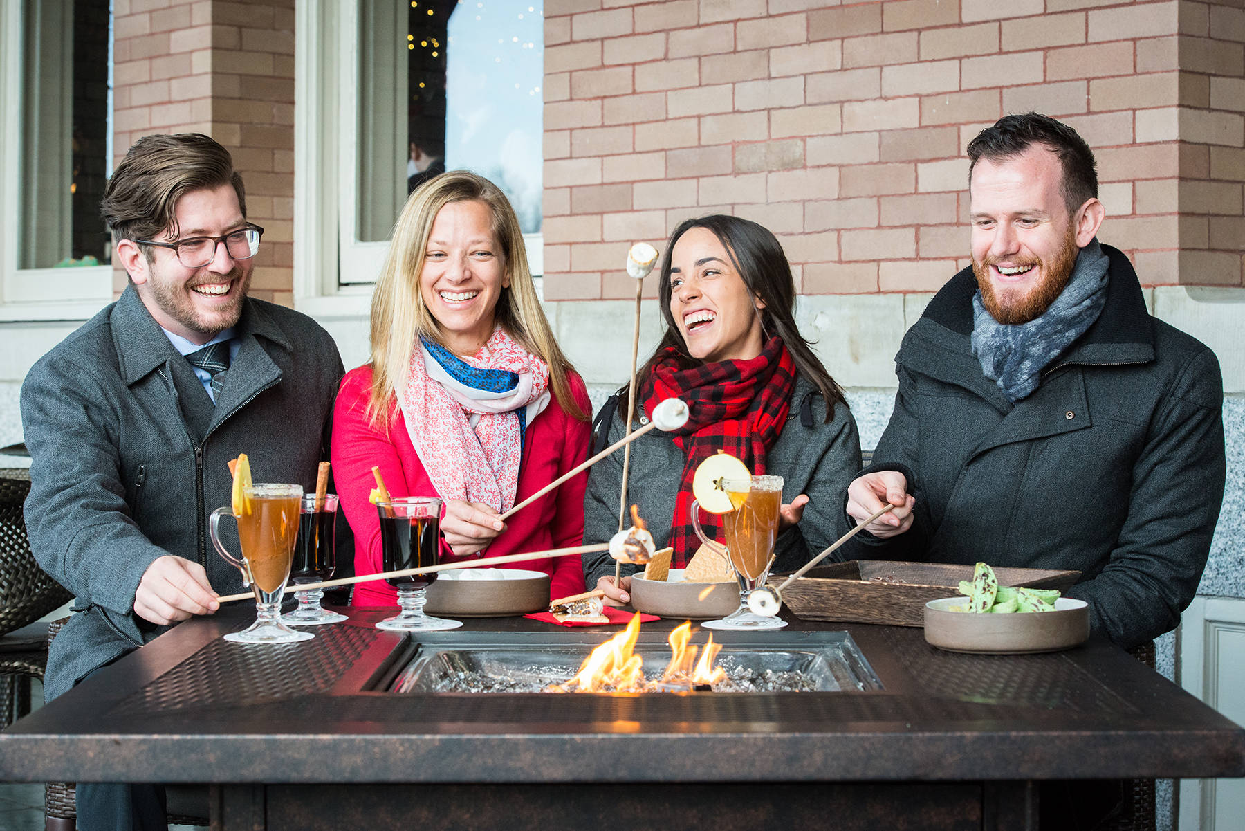 Enjoying smores on the patio at the Fairmont Empress Hotel is one of the treats of the Victoria holiday season. Rhymes With Orange Photography