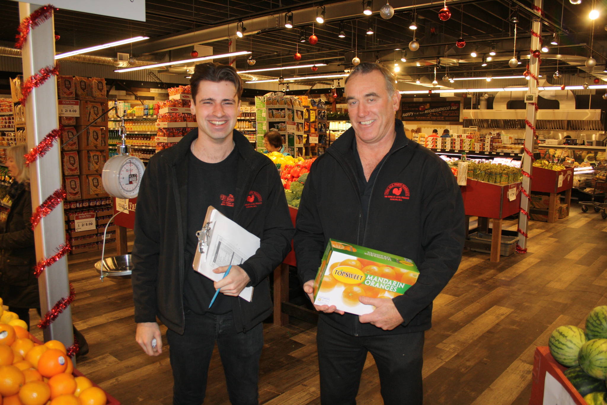 Store manager Chris Steel and owner Lorne Campbell in the newly opened Old Farm Market at Estevan and Cadboro Bay roads. The renovated store has 6,000 square feet of fresh produce, a deli and fresh prepared meals to go. (Travis Paterson/News Staff)