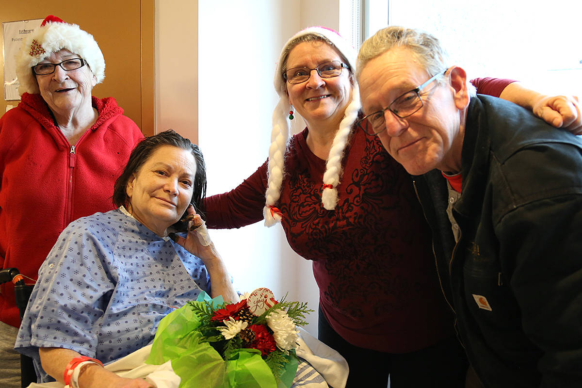 Sandra and Ken Murphy were stunned when a team from Langley’s Acts of Kindness ministry, along with lifetime friends Lola and Bella Howet, arrived in Sandra’s hospital room in Abbotsford on Christmas Eve with news that their home will be the subject of the 2020 Extreme Home Repair. (Michael Dauncey/Church in the Valley – Acts of Kindness)