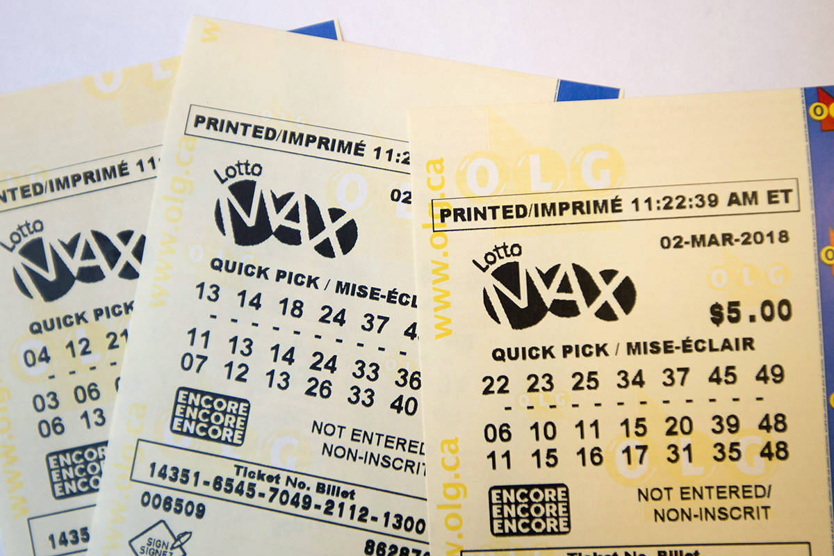 A lotto Max ticket is shown in Toronto on Monday Feb. 26, 2018 (The Canadian Press)
