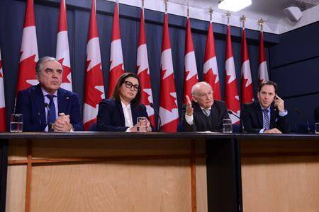B’nai Brith CEO Michael Mostyn, right to left, and B’nai Brith Senior Legal Counsel David Matas are joined by Iranian-Canadian community leaders Avideh Motmaen-Far and Reza Banai as they hold a press conference at the National Press Theatre in Ottawa on Monday, Jan. 13, 2020. THE CANADIAN PRESS/Sean Kilpatrick