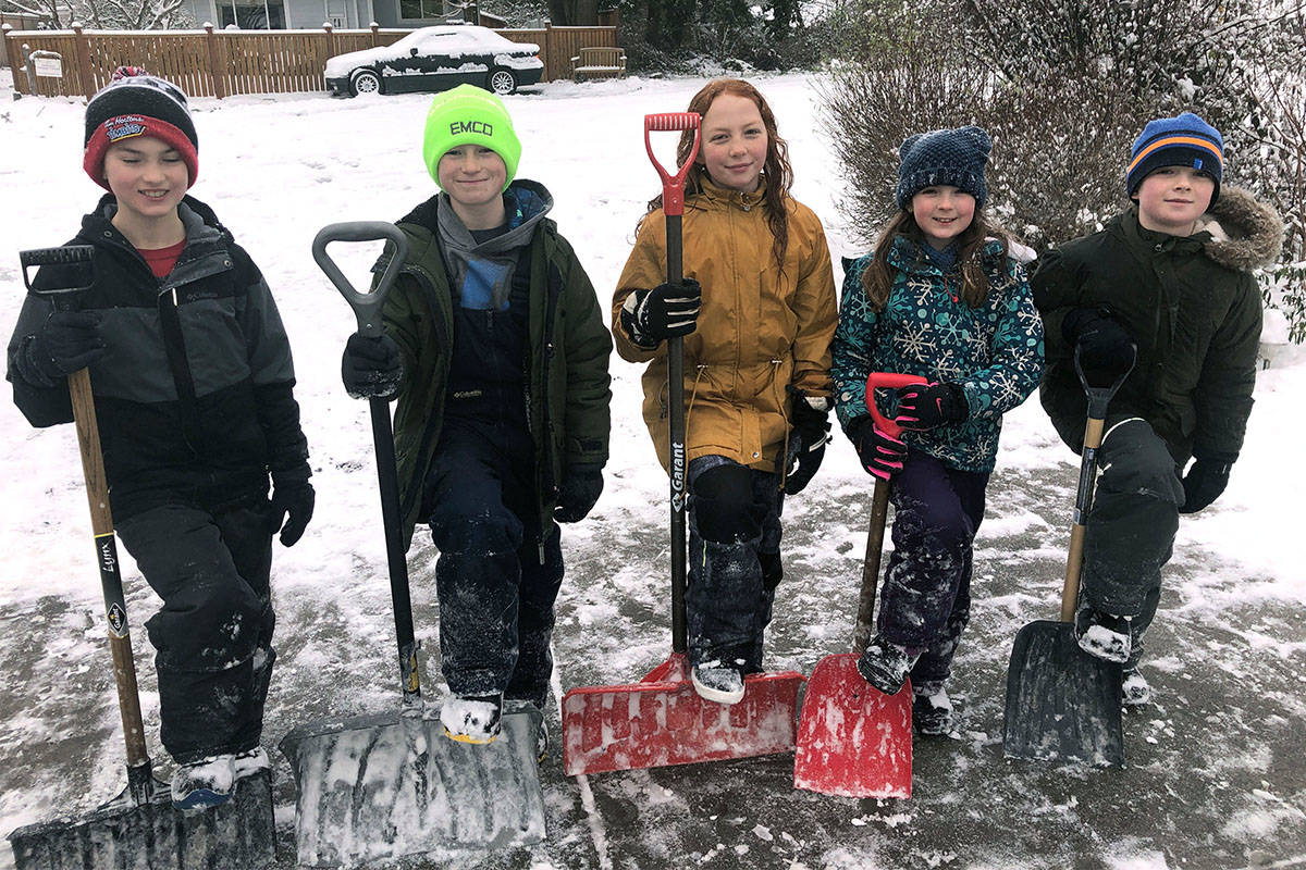 These Parksville students raised $185 for charity by shovelling sideways during their snow day on Wednesday, Jan. 15. From left: Josh Spencer, Kai Carleton, Hayden Sjogren, Mya Spencer and Layne Taylor. Not pictured: Isla Carleton. (Courtesy of Graeme Carleton)