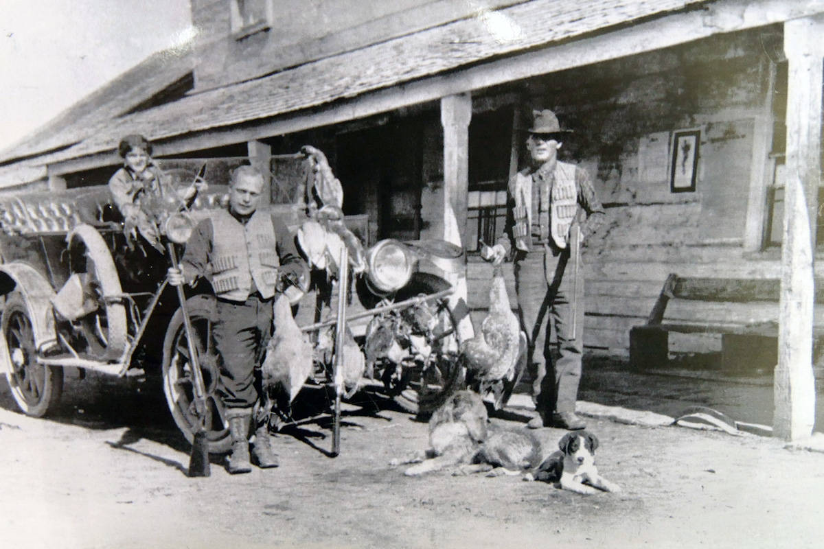 Earnest Barker (front left) with the two unidentified figures. (Submitted)