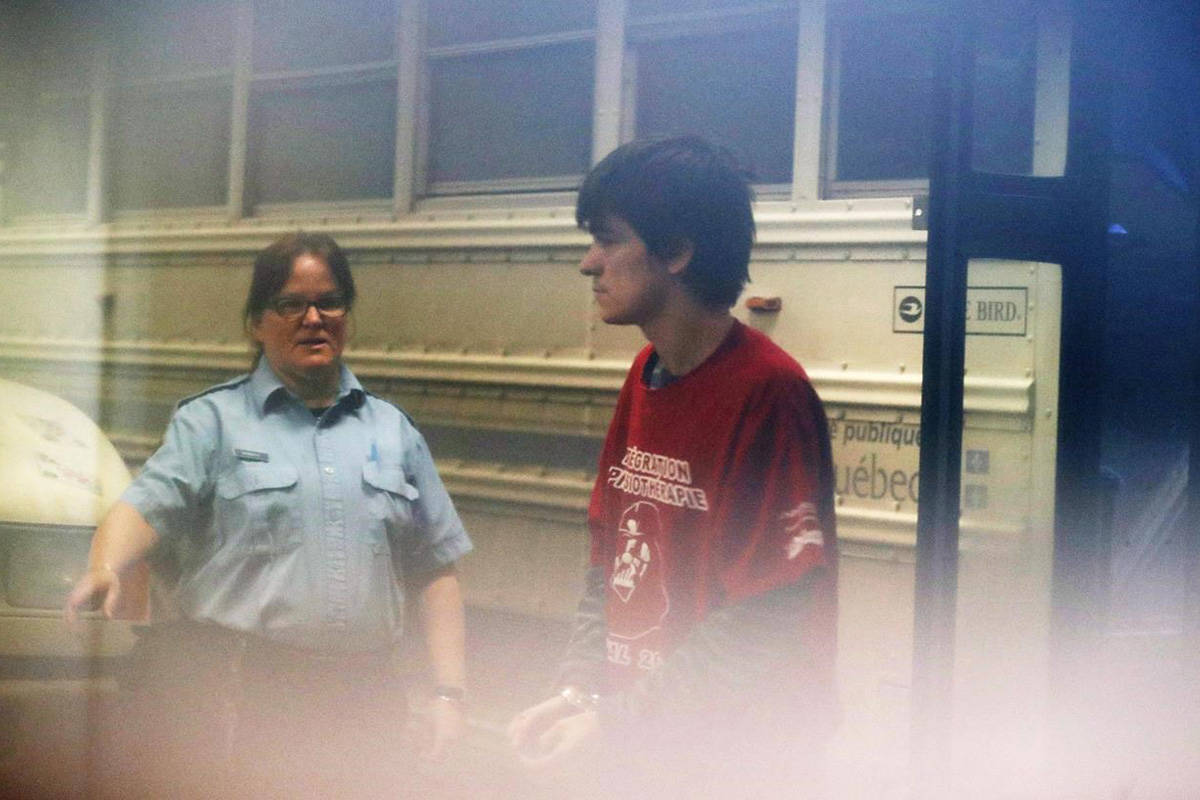 FILE – Alexandre Bissonnette, a suspect in a shooting at a Quebec City mosque, arrives at the court house in Quebec City on February 21, 2017. THE CANADIAN PRESS/Mathieu Belanger - POOL