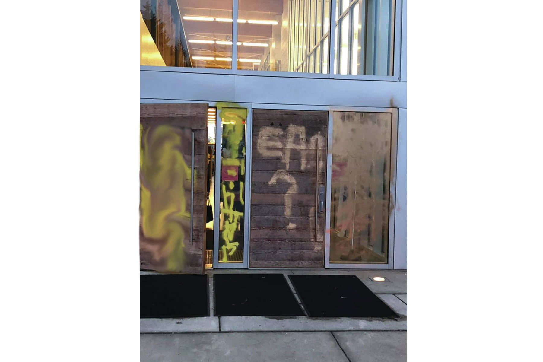 Photos on social media were making the rounds on Jan. 30, 2020, showing spray-painted expletives at Ecole au-cœur-de-l’île in Comox. The Comox Valley Record has edited the photos due to their sensitive content. (Facebook)