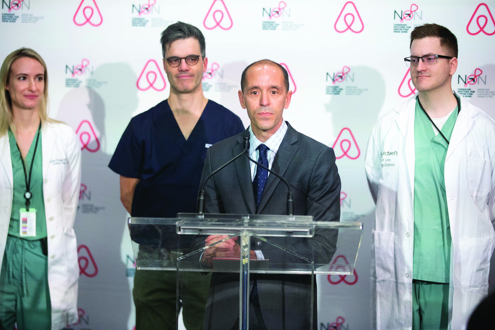 Chris Lehane, Airbnb’s senior vice president of global policy and communications, joined by doctors, takes questions during a news conference in Toronto, on Wednesday, February 5, 2020. THE CANADIAN PRESS/Chris Young