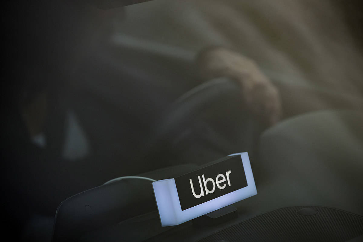 An Uber driver is seen after the company launched service, in Vancouver, Friday, Jan. 24, 2020. Ride-hailing companies Uber and Lyft say they are on the road in Metro Vancouver with limited service, less than a day after receiving long-awaited approval for an operating licence. THE CANADIAN PRESS/Darryl Dyck