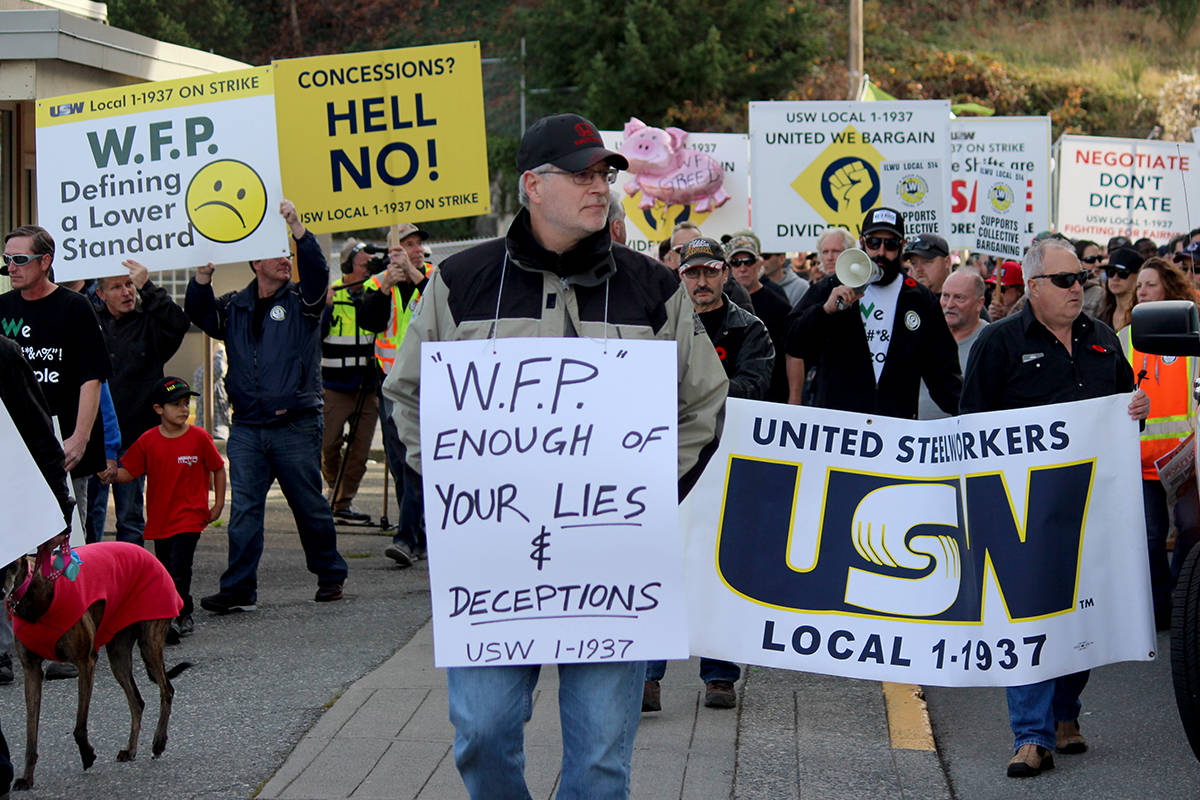 Western Forest Products and United Steelworkers Local 1-1937 have reached a tentative agreement to end a more than seven-month-long strike. Pictured here, workers during a rally in Nanaimo on Nov. 6, 2019. (Black Press File Photo)