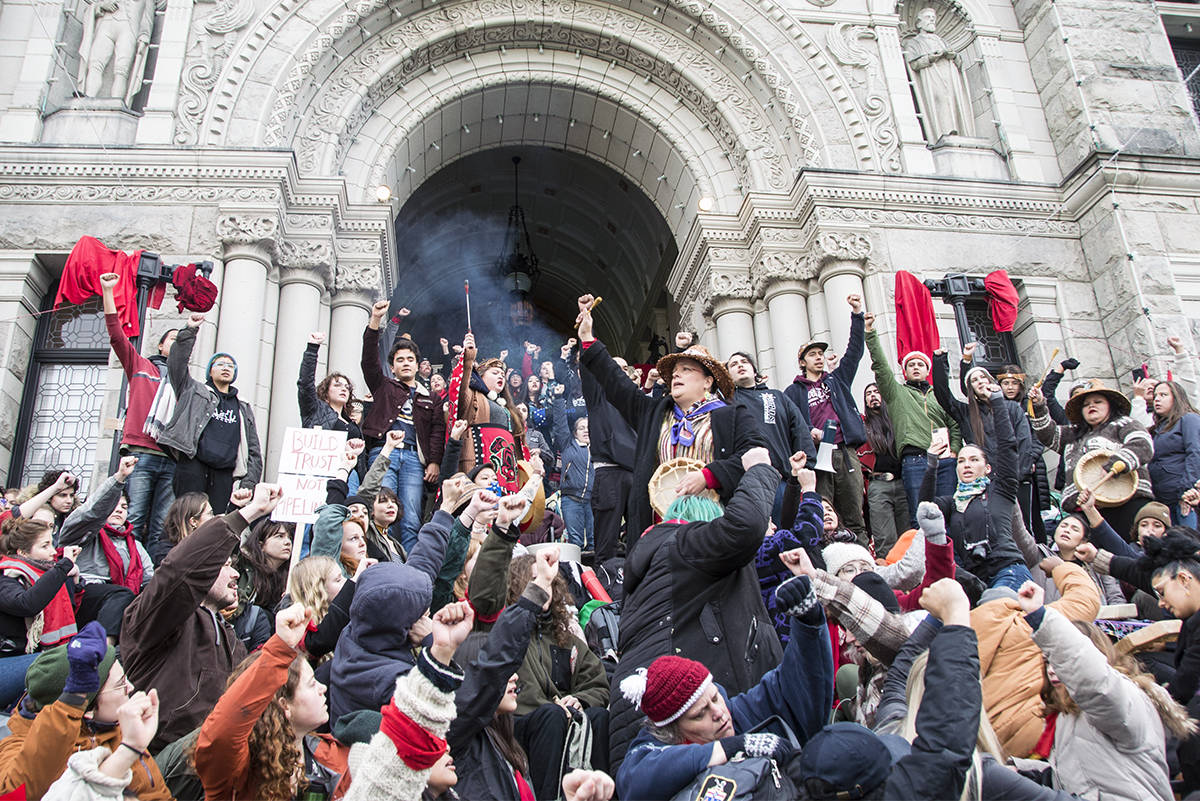 Hundreds of demonstrators block access to the BC Legislature in Victoria on Feb. 11, 2020 in support of the First Nations hereditary chiefs who are fighting a natural gas pipeline in northern B.C. (Nina Grossman/News Staff)