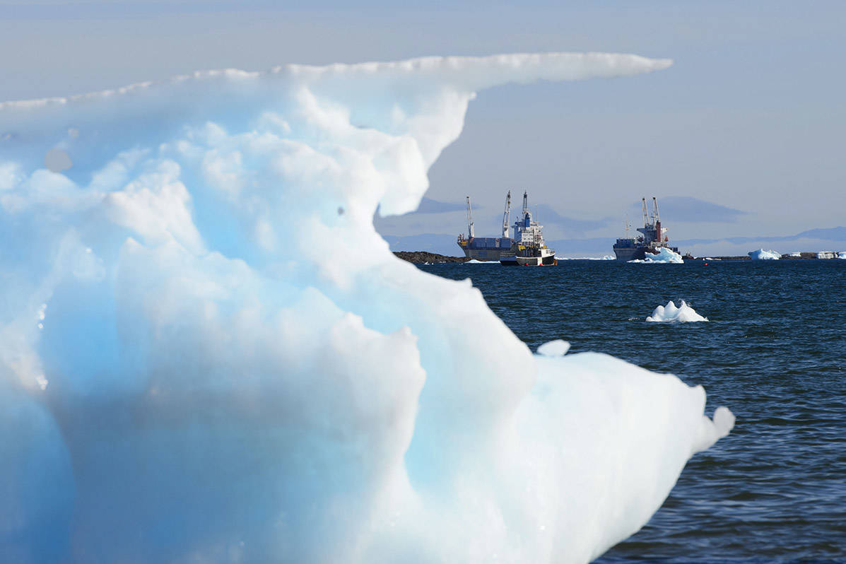 The federal government is expected to approve international measures this week that would reduce the environmental impact of Arctic shipping but would cost northern families hundreds of dollars a year. Ships are frames by pieces of melting sea ice in Frobisher Bay in Iqaluit, Nunavut on Wednesday, July 31, 2019. THE CANADIAN PRESS/Sean Kilpatrick