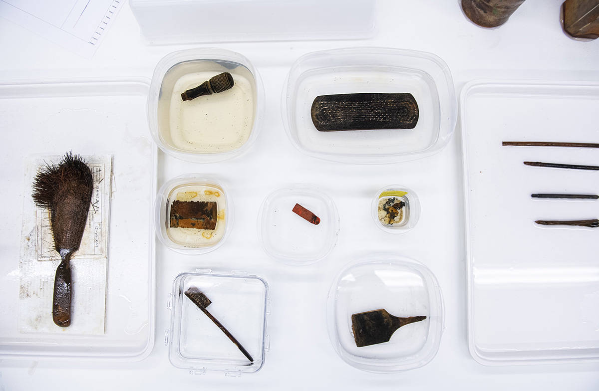 A collection of new artifacts from the wreck of the Franklin Expedition’s HMS Erebus, is seen at Parks Canada Conservation Laboratories in Ottawa, on Thursday, Feb. 20, 2020. Artifacts include a hairbrush, handle of a stamp for a seal, clothes brush, comb, piece of sealing wax, chain, toothbrush and paintbrush. THE CANADIAN PRESS/Justin Tang