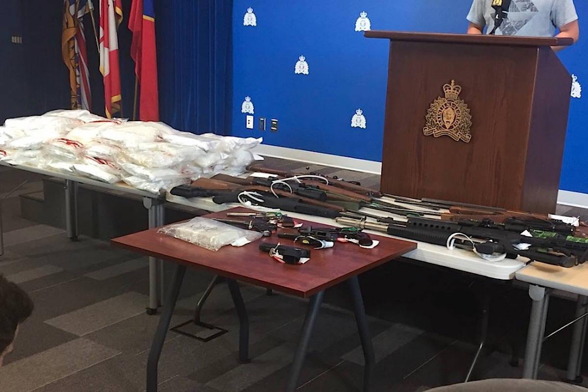 Police seized more than 55 kilograms of cocaine, 47 kilograms of methamphetamine, one kilogram of heroin, 15 firearms, $150,000 in cash and a large-capacity magazine from the home of Saanich man William Milton Barnes. They also seized two high-speed boats. (Kat Slepian/Black Press Media)