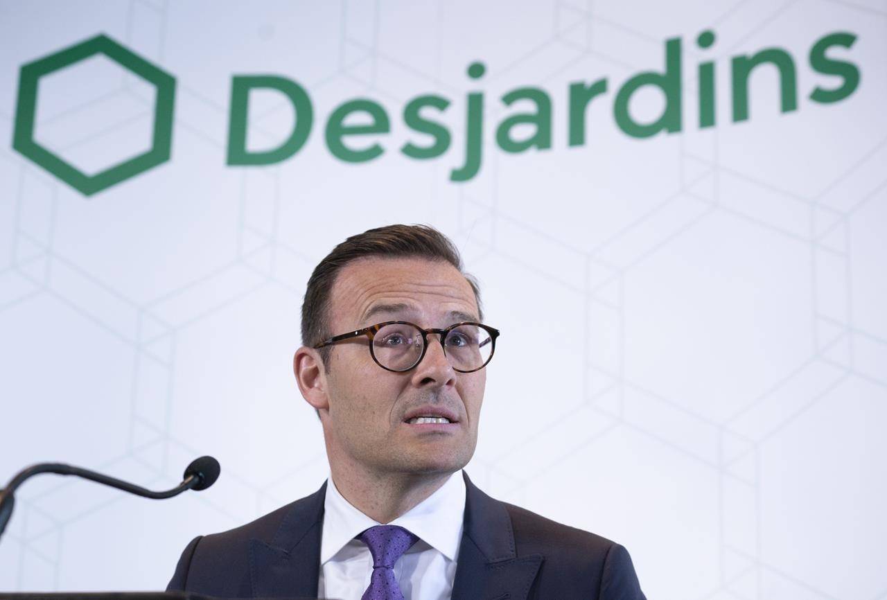 Desjardins President and CEO Guy Cormier reads a statement during a news conference in Montreal on June 20, 2019. THE CANADIAN PRESS/Paul Chiasson