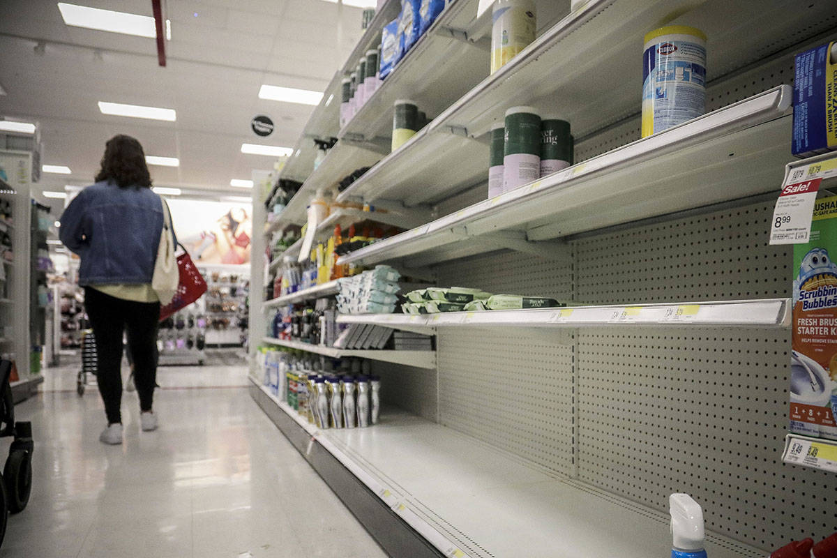 FILE - In this March 3, 2020 file photo, empty shelves for disinfectant wipes wait for restocking, as concerns grow around COVID-19, in New York. New polls from Insights West and the Angus Reid Institute, released on Wednesday, March 11, 2020, show Canadians’ increasing concerns about COVID-19 are leading to behaviour changes, such as stockpiling. (AP Photo/Bebeto Matthews, File)