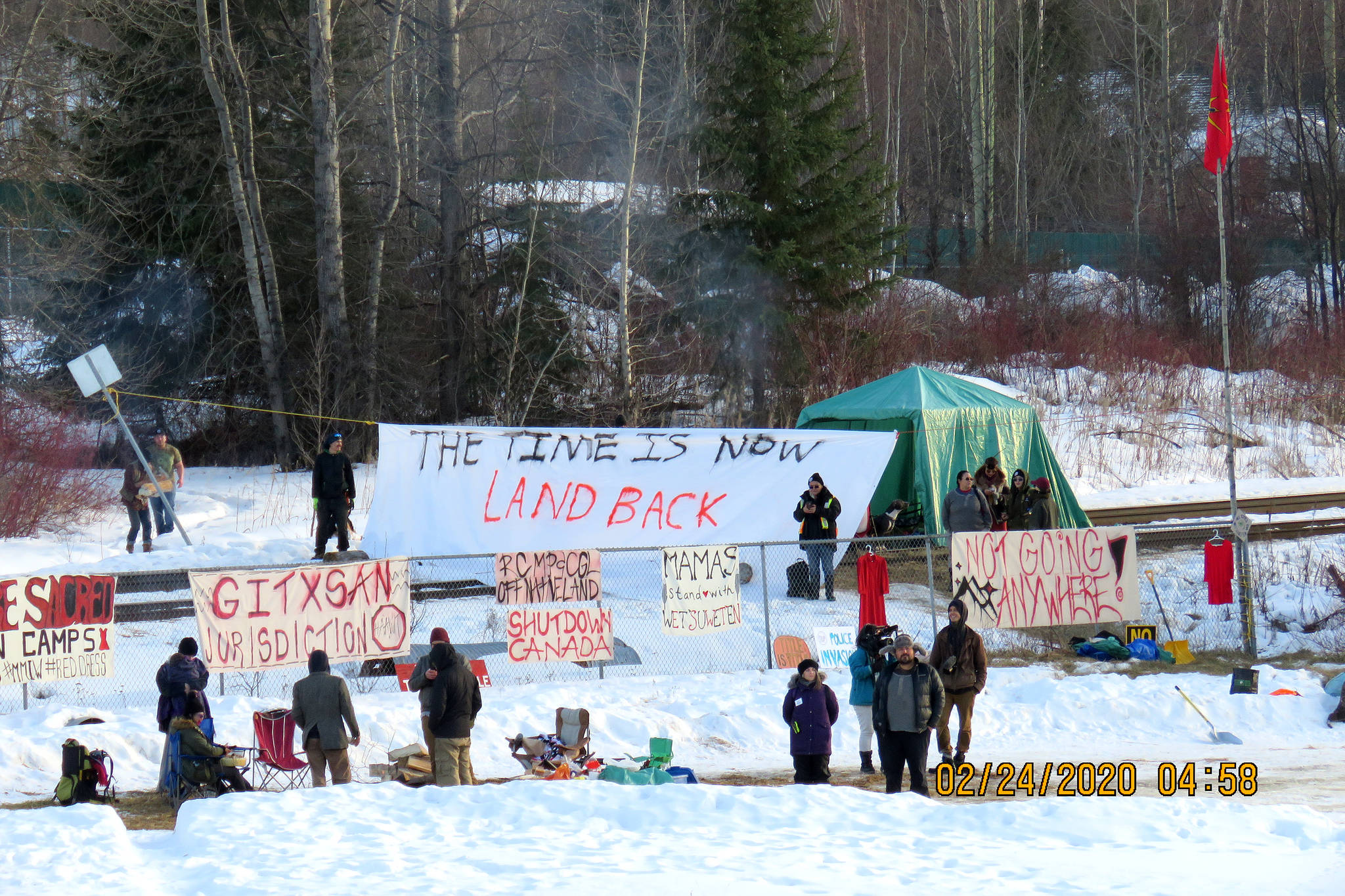 FILE - In this file photo, members of the Gitxsan Nation resurrect their blockade of the main CN rail line in New Hazelton Feb. 24. A new Research Co. poll released Tuesday, March 17, 2020 suggests most B.C. residents support carrying on with construction of the Coastal GasLink natural gas pipeline in northern B.C. (Randall Shoop photo)