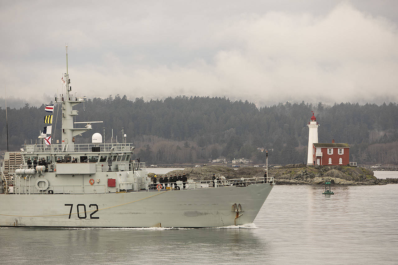 The HMCS Nanaimo sails past the Fisgard Lighthouse upon it’s return to Victoria following a two-month deployment in 2018. (Black Press Media file photo)