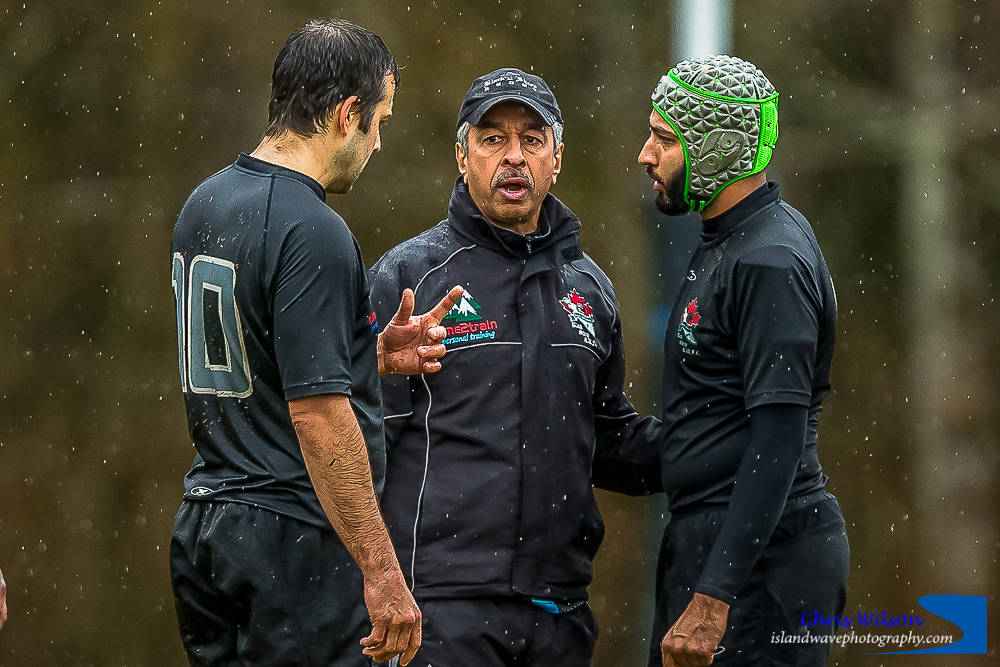 Port Alberni Black Sheep coach Jas Purewal, centre, talks to son Gavin, right, and another Black Sheep player during a home game against Cowichan Piggies on April 7, 2018. (PHOTO COURTESY CHRIS WILSON, ISLANDWAVEPHOTOGRAPHY.COM)