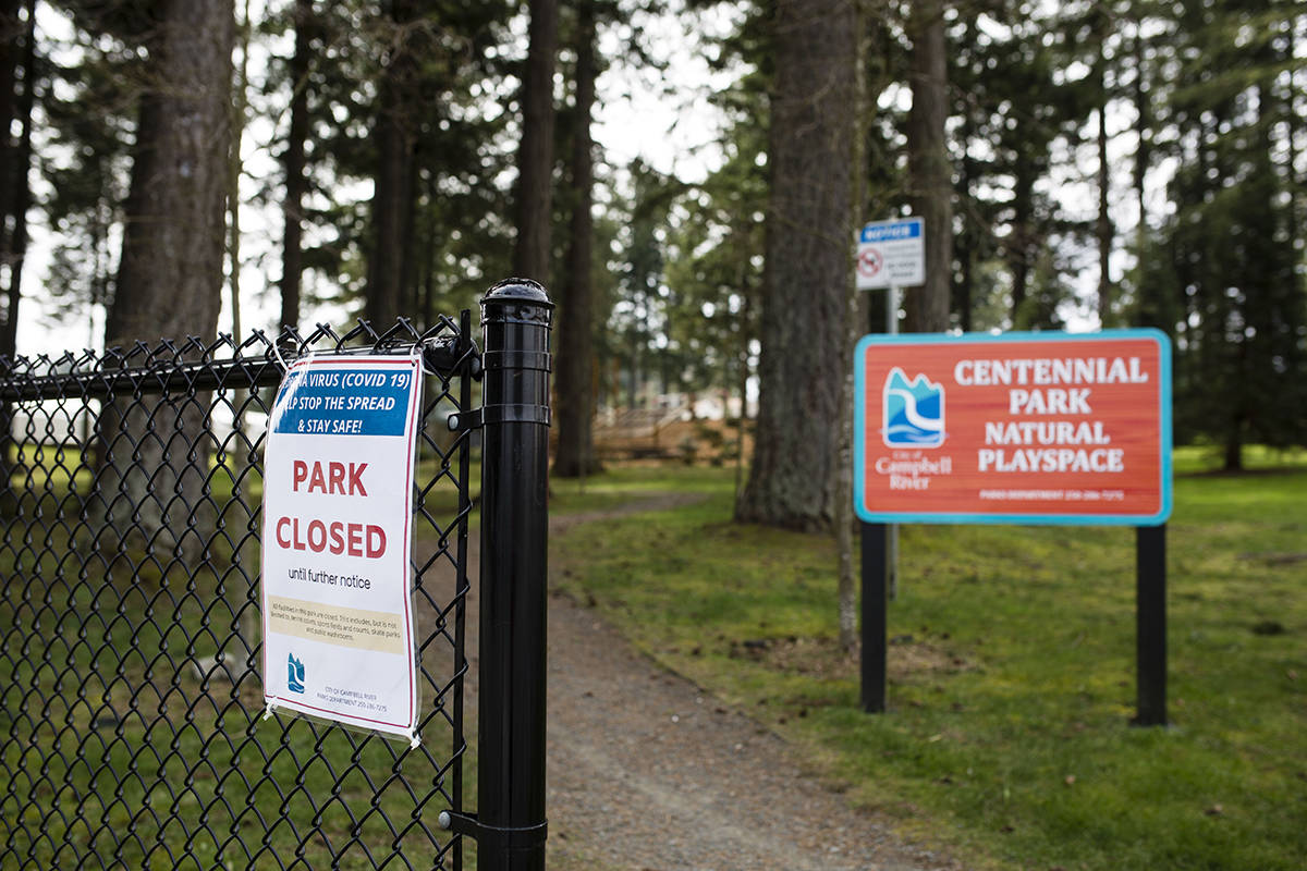 A closed sign hangs next to an entrance to Centennial Park Playground on March 22, 2020. The City of Campbell River will keep certain trails open as long as people are able to maintain social distances. Photo by Marissa Tiel – Campbell River Mirror
