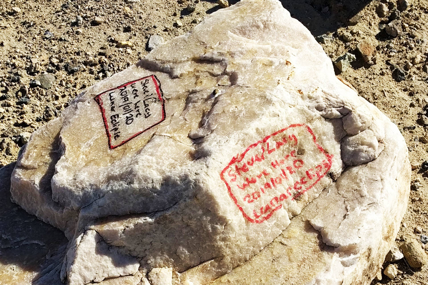 Graffiti on two sides of a boulder in Death Valley National Park is from 2019 and 2020, marked “Steve & Lacy”. The National Parks Service is seeking a man from Grand Forks, B.C., in connection with the graffiti. (US National Parks Service)