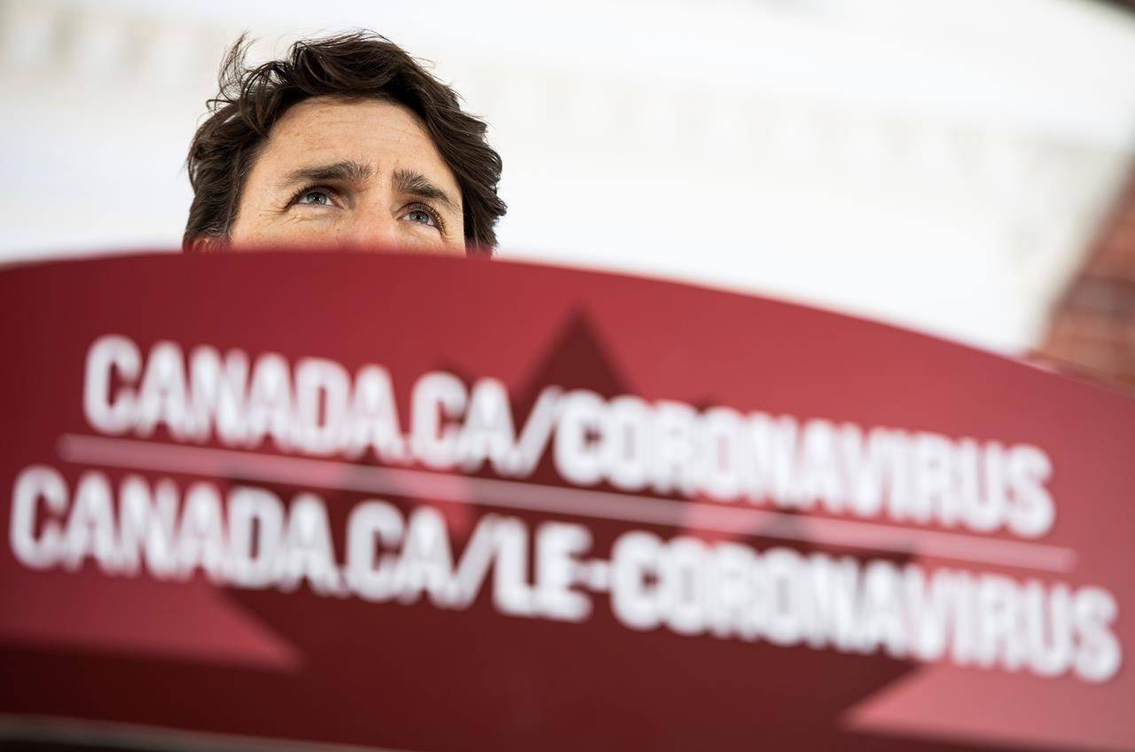 Prime Minister Justin Trudeau in front of his residence at Rideau Cottage in Ottawa, on Sunday, March 22, 2020. (Justin Tang/ THE CANADIAN PRESS)