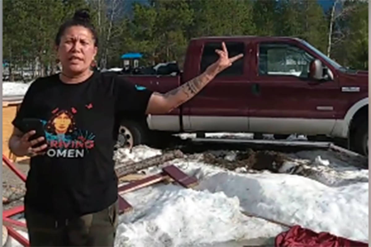 Tiny House Warriors group leader Amanda Soper stands in front of her truck that she said was stolen and rammed into one of the group’s houses during an April 19 attack on the group’s encampment. Facebook photo